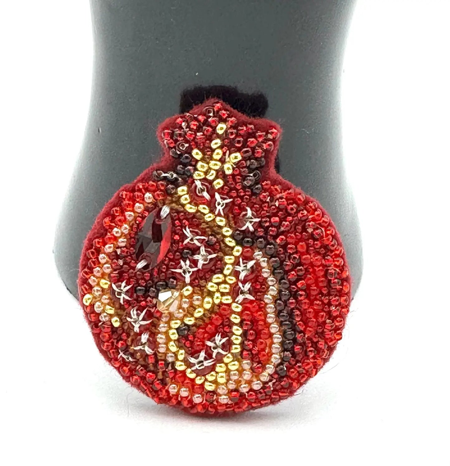 Badge Made from Handmade Beads Ukraine UK Aid