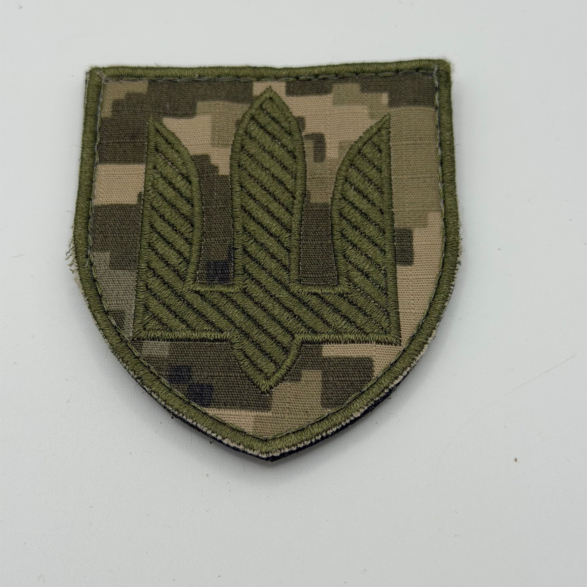 Velcro Army patch in Ukrainian pixel camo showing the Trident
