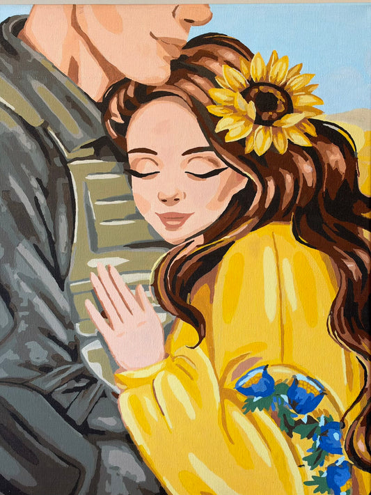 “The Dearest Embrace”, an oil painting of a woman with closed eyes smiling as she leans against a soldier in camouflage. He cradles her long brown hair, which is adorned with a sunflower. She wears a yellow blouse decorated with blue flowers against a pale blue background.