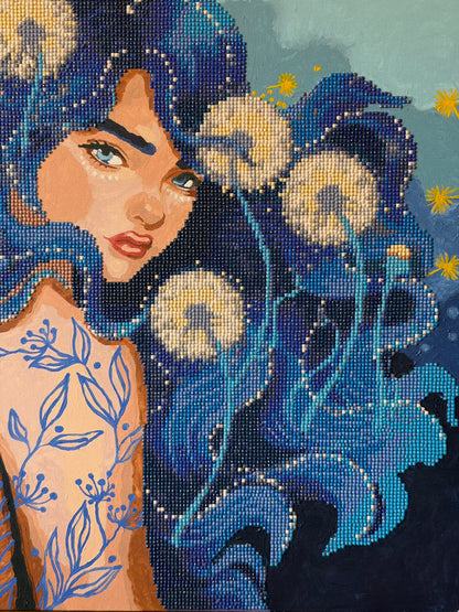 Mixed-media portrait combining oil painting and beadwork. A blue-eyed woman looks over her shoulder, with long blue and turquoise hair decorated with pale beaded butterflies. Blue botanical patterns cover her shoulder and back, while yellow starbursts dot the background.