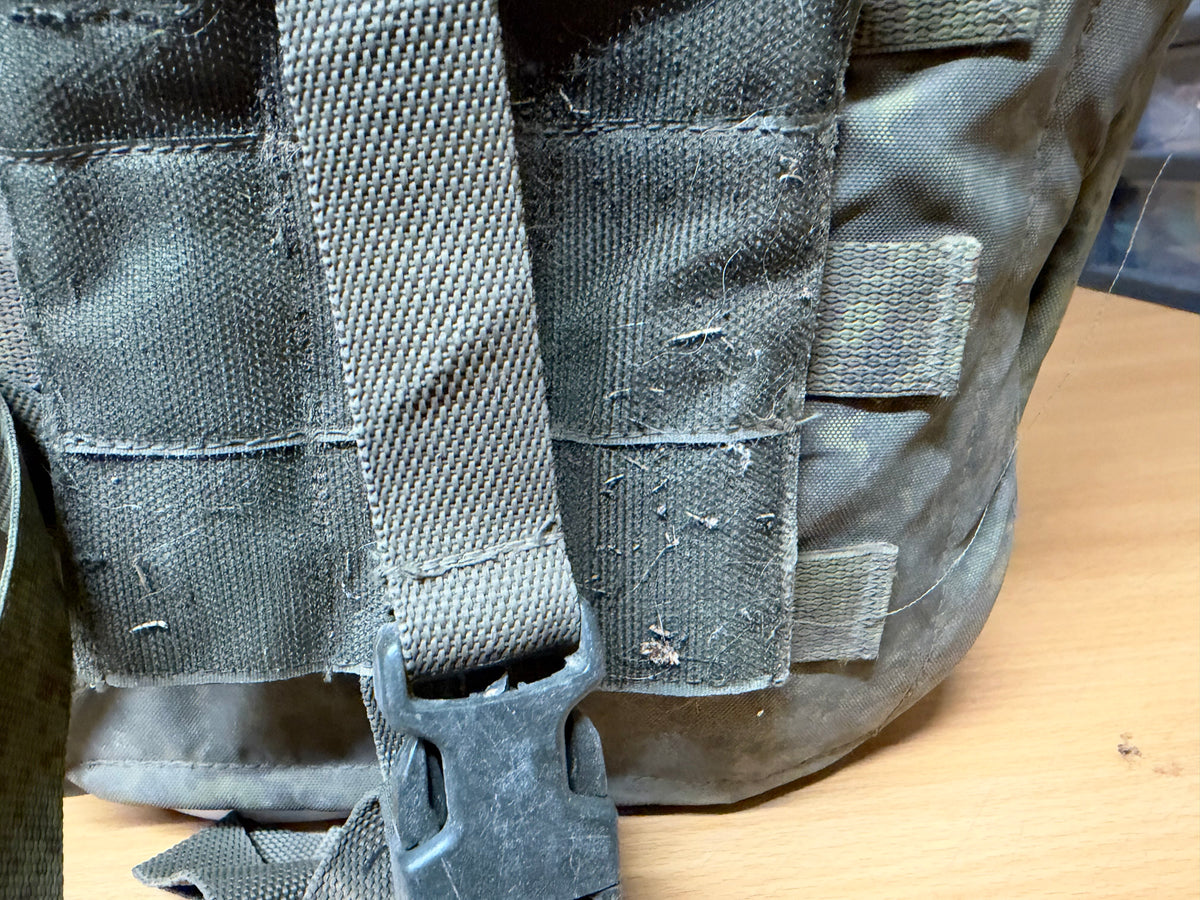 Close-up of the 6B45 vest’s worn webbing, fastening straps and field-used stitching.