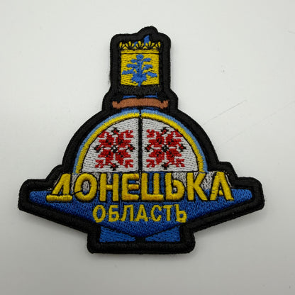 Emblem with decorative elements and text on a white background