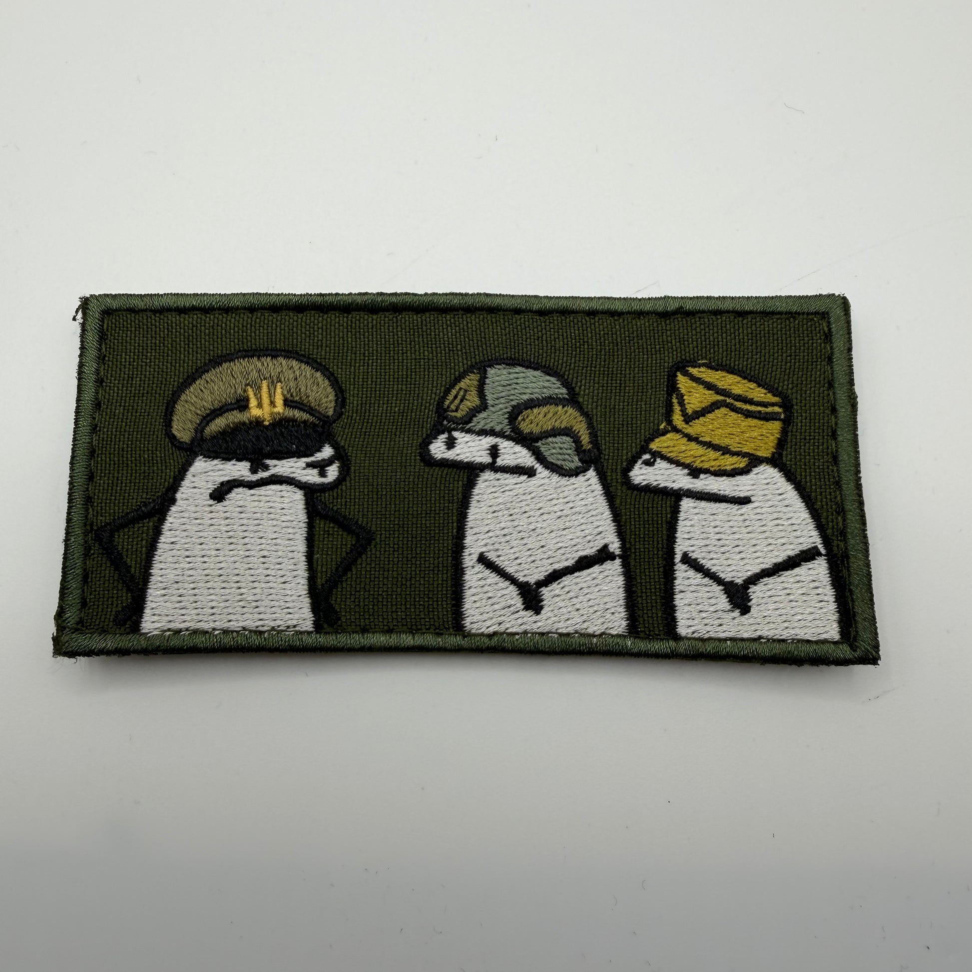 Flork velcro patch showing three figures