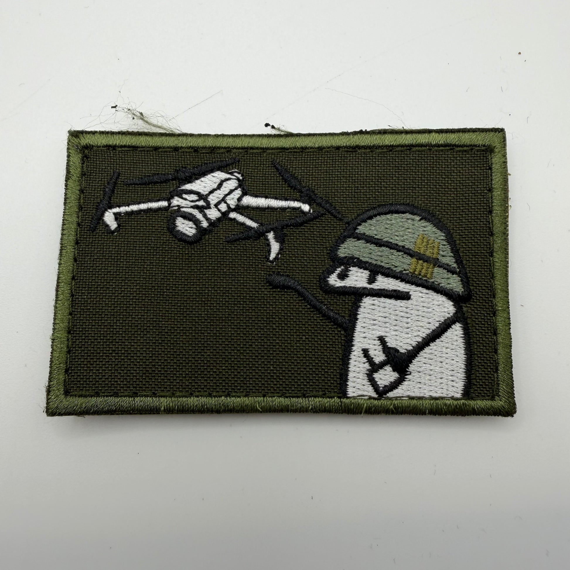 Flork patch showing a drone being launched