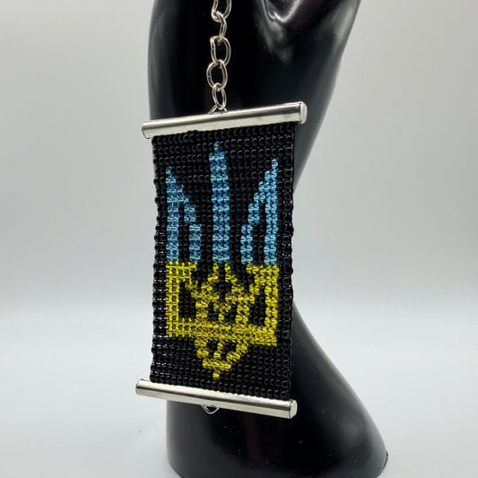 Black, blue and yellow trident beaded keyring