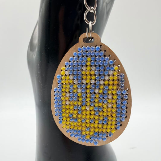 Blue and yellow trident bead decoration
