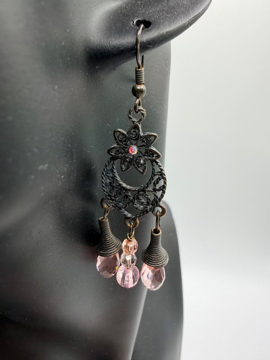 3 Crystals suspended from a moon 