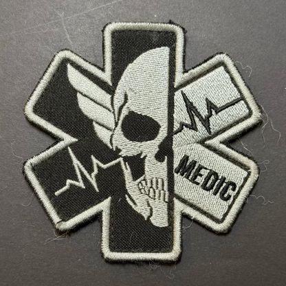 Patch with skull design and 'MEDIC' text on a dark background