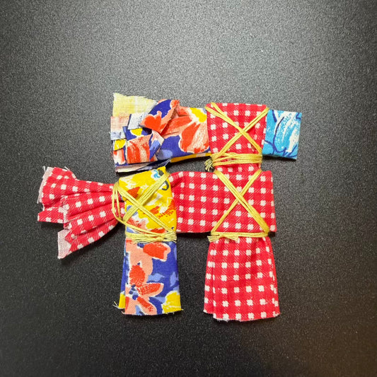 Colorful origami kimono on a black background