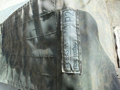 Close-up of a Russian identification label sewn onto a component of the captured 6B45 body-armour vest.