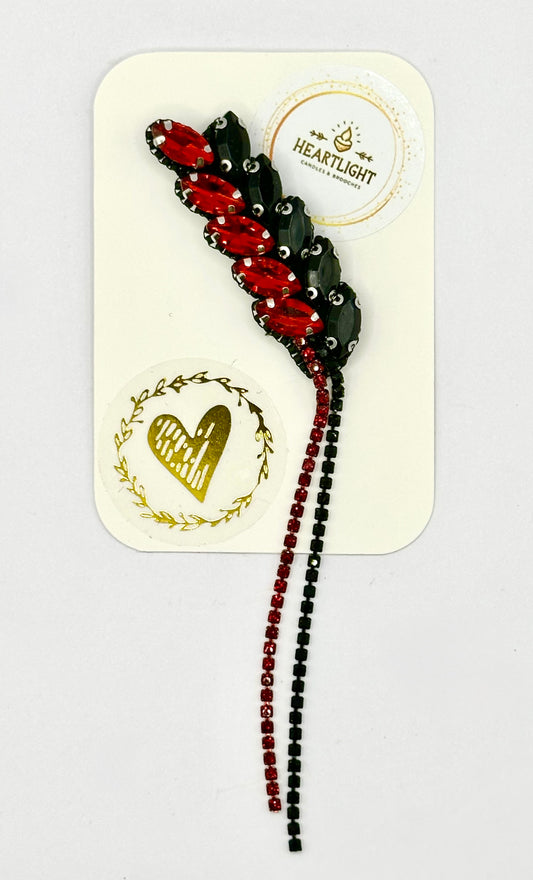 Red and Black Jewelled Badge