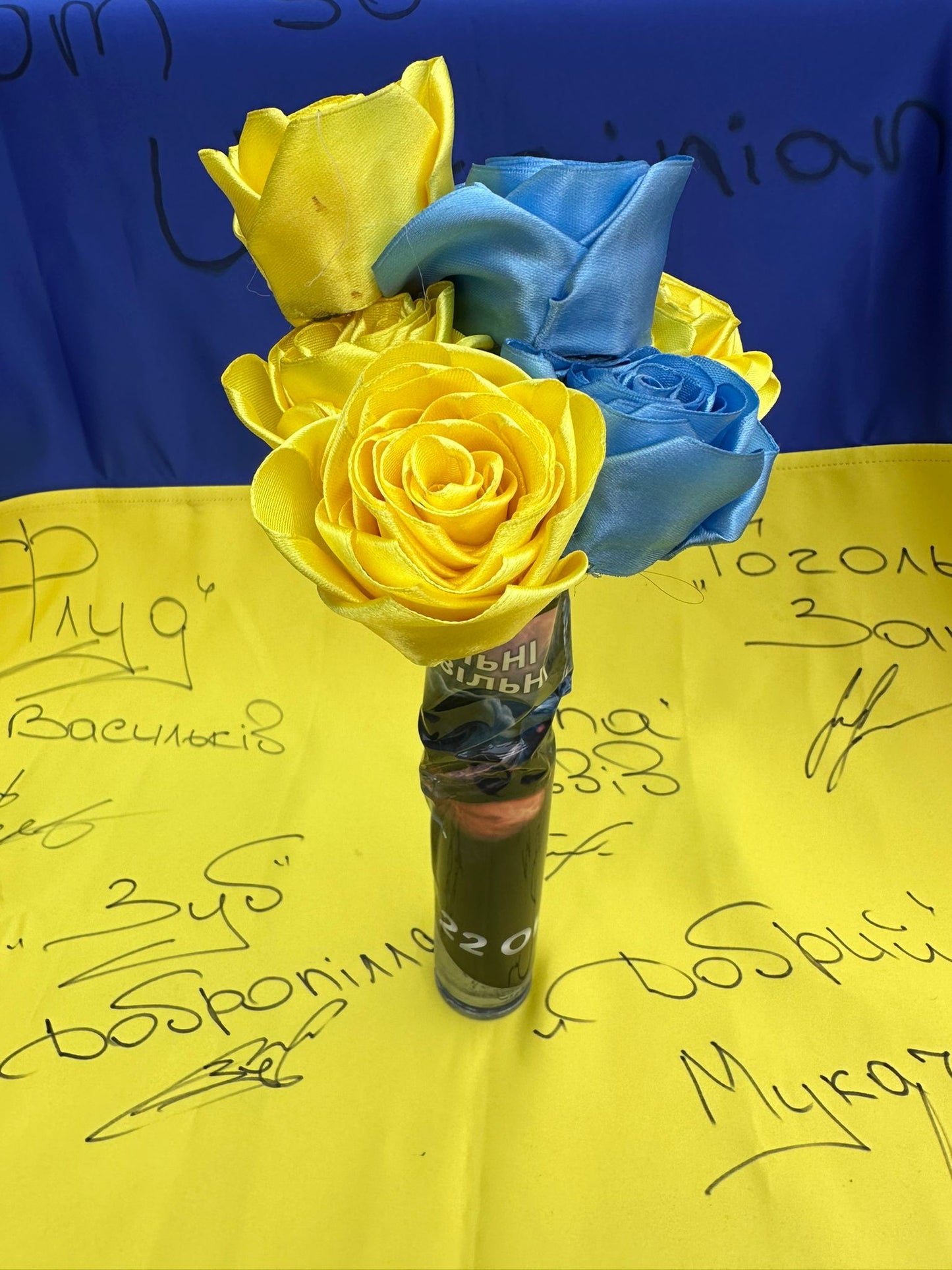 30mm canon shell filled with handmade blue and yellow flowers