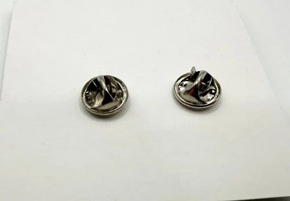 Pair of silver earrings on a white background