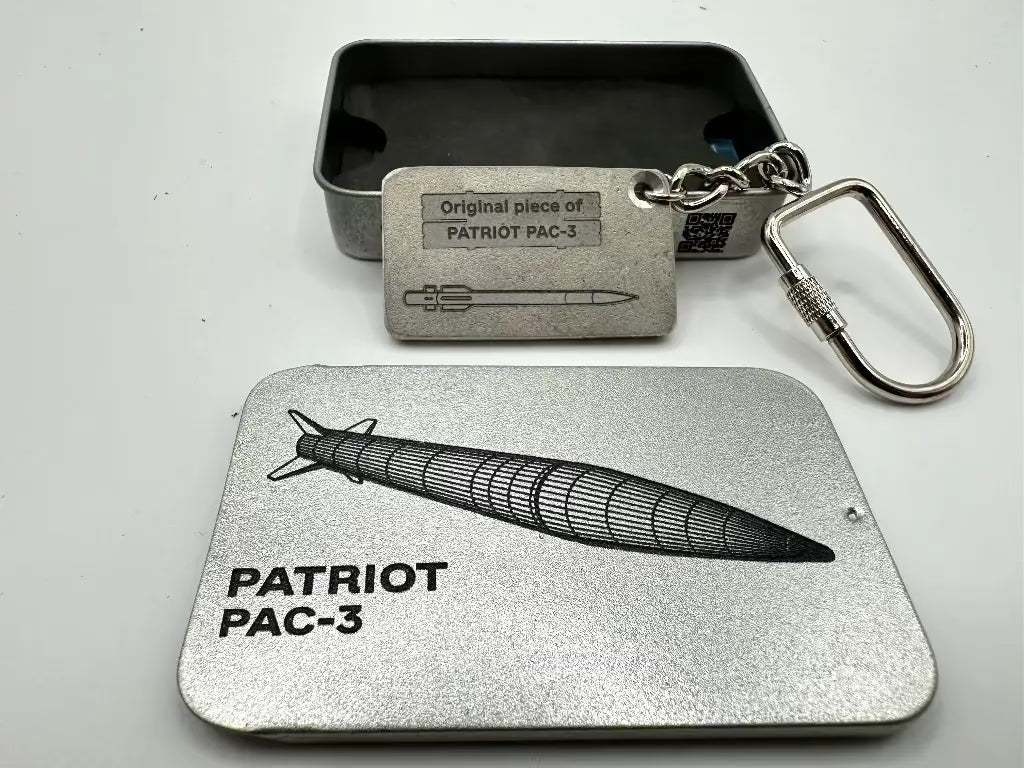 Metal keychain and card with 'Patriot PAC-3' design on a white background