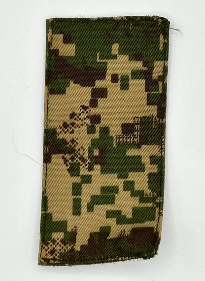 Digital camouflage fabric patch on a white background