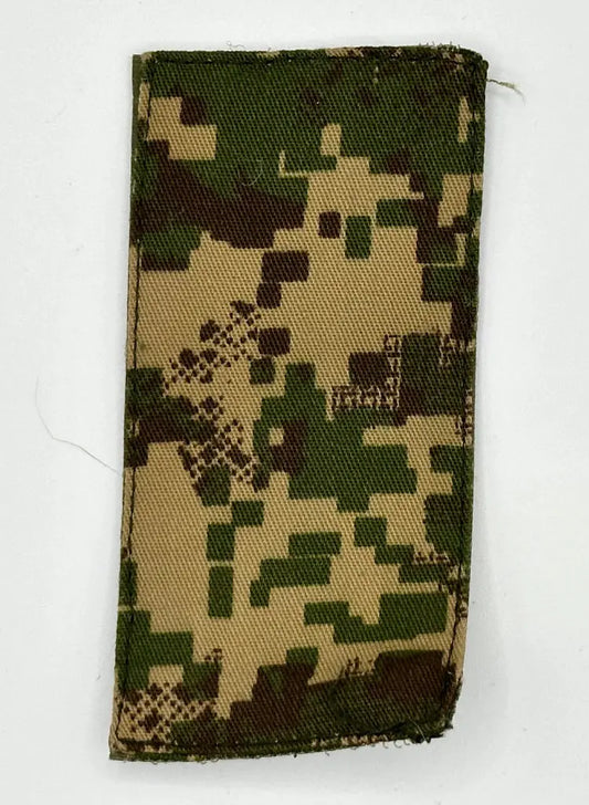 Digital camouflage fabric patch on a white background