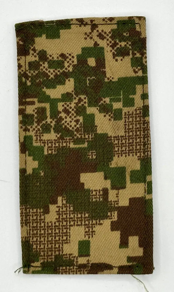 Camouflage-patterned fabric on a white background
