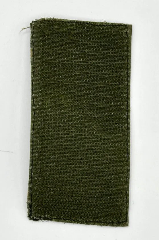 Green woven patch on a white background