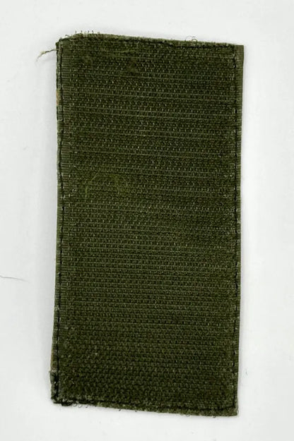 Green woven patch on a white background