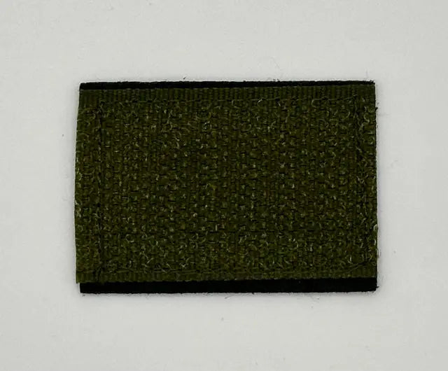 Green rectangular patch with black border on a light gray background