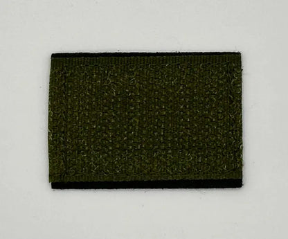Green rectangular patch with black border on a light gray background