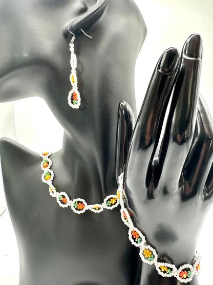 Jewellery set with necklace and earrings on a mannequin hand